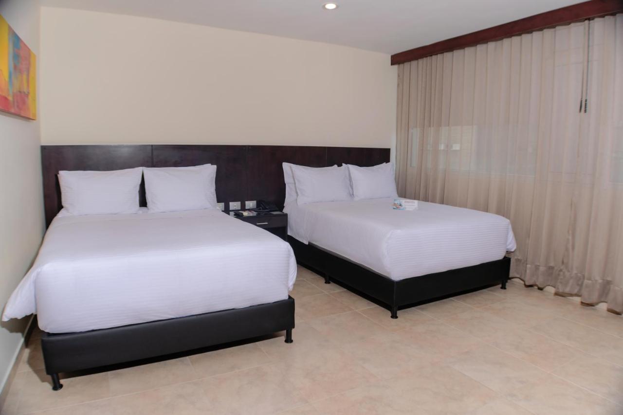 Hotel Casino Internacional Cucuta Exterior photo A room at the hotel