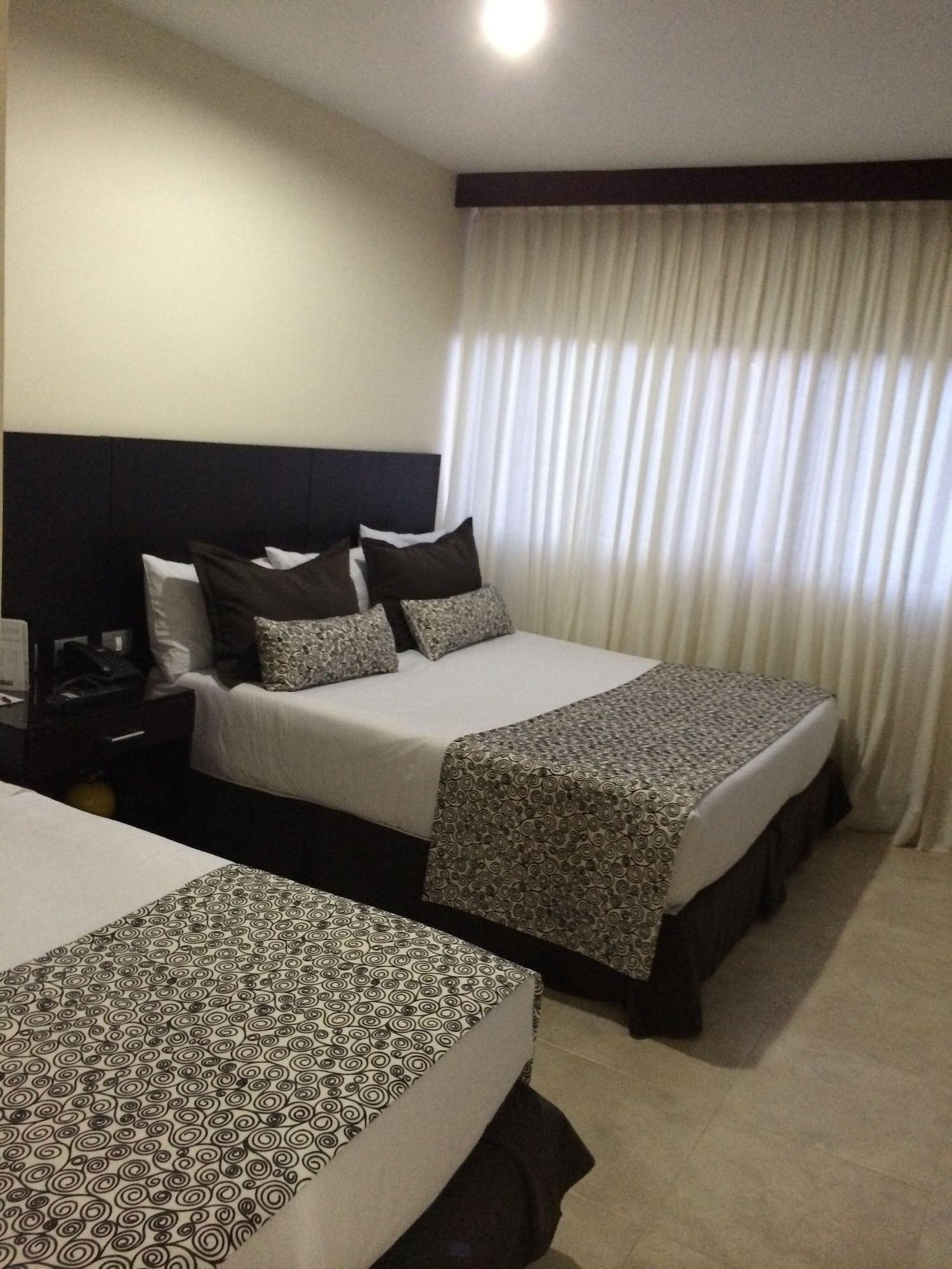 Hotel Casino Internacional Cucuta Exterior photo A bed runner